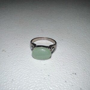 Elegant Silver Ring with Green Stone